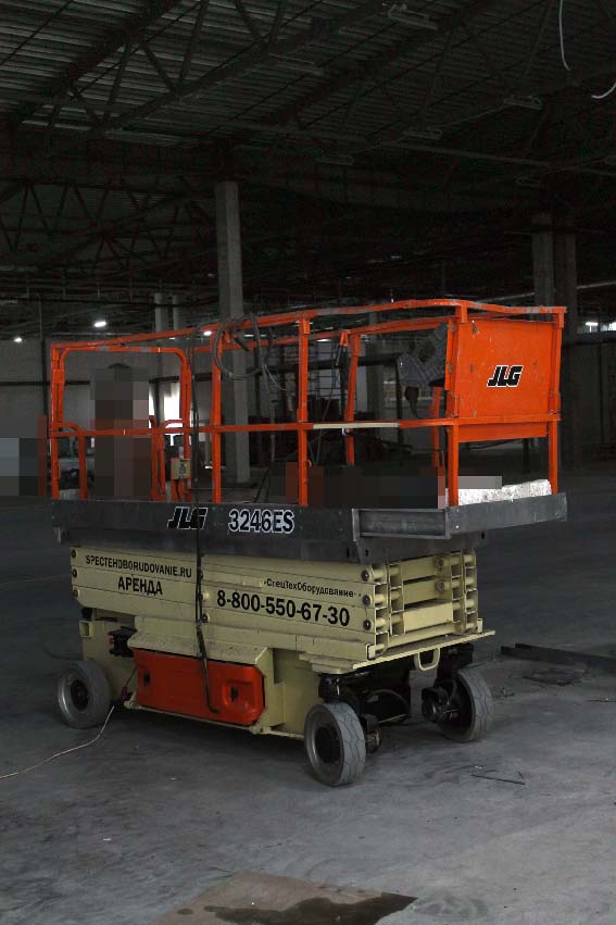 наша JLG3246ES в работе ножничный подъёмник